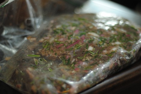 Rosemary balsamic flank steak marinating in a Ziplock bag. (photo)